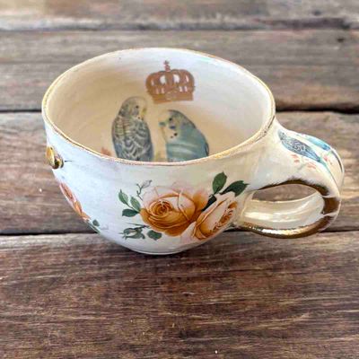 Undulater og blomster, kopp keramikk ca 7 cm 